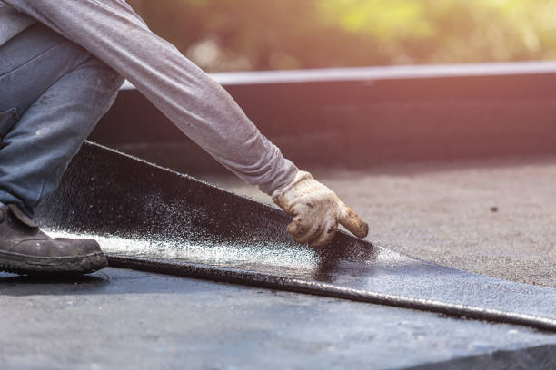 Professional Waterproofing technician working in Westwood, KY
